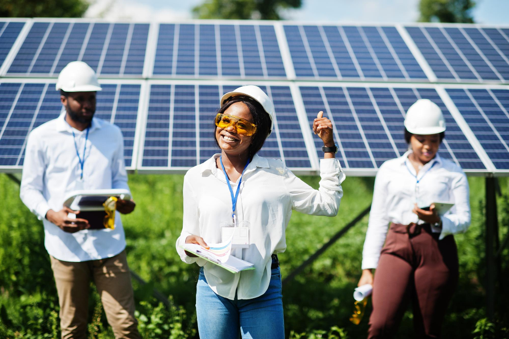 african-american-technician-checks-maintenance-solar-panels-group-three-black-engineers-meeting-solar-station